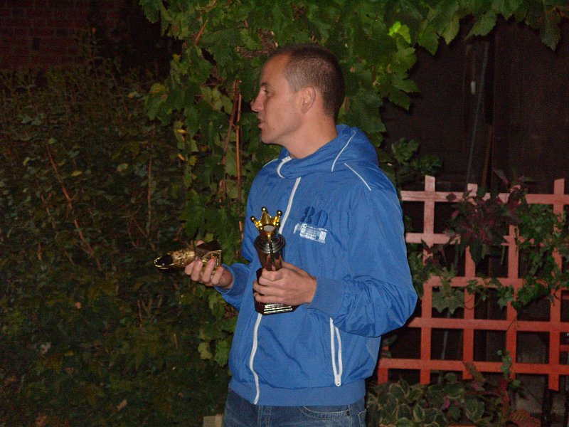 Dave C.jpg -  Dave Cookson holding the Players' Player trophies. 